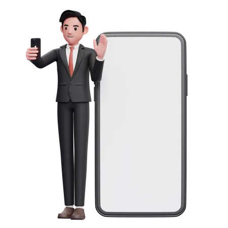 Businessman in black formal suit standing while making video call and waving hand on big phone background 3D Illustration