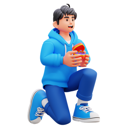 반지 상자를 무릎에 얹고 앉아 누군가에게 청혼하는 후드티 소년  3D Icon