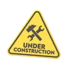 bajo signo de construcción