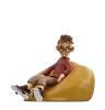 Young Man Sitting On Bean Bag